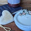 candle in cement bowl