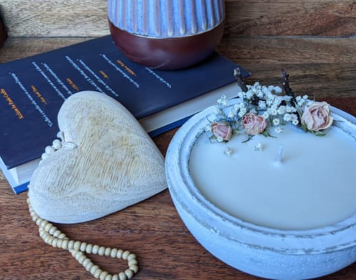 candle in cement bowl